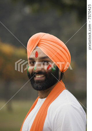 A Sikh man smiling  A Sikh man smiling  7870425