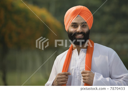 A Sikh man smiling A Sikh man smiling 7870433