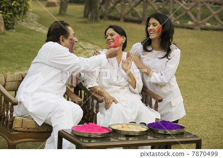 Family celebrating Holi  Family celebrating Holi  7870499