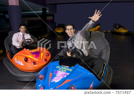 Having fun in bumper cars  Having fun in bumper cars  7871487