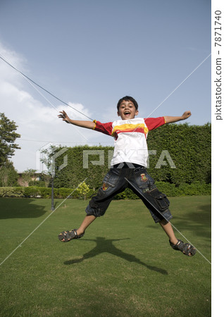 Boy jumping in the air  7871740