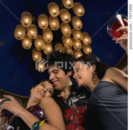 Friends enjoying their drink Friends enjoying their drink 7871966