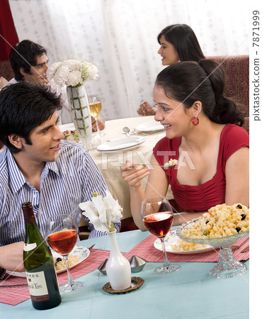 Couple enjoying a meal Couple enjoying a meal 7871999