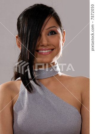 Woman posing and smiling Woman posing and smiling 7872050