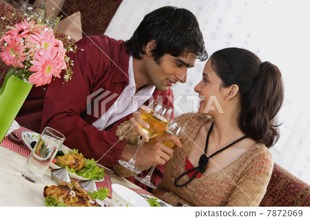 Couple enjoying a meal Couple enjoying a meal 7872069