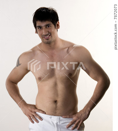 Man without a shirt posing Man without a shirt posing 7872073