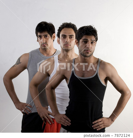 Three men posing Three men posing 7872124