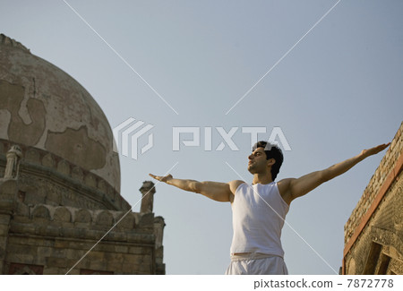 Man stretching out his arms Man stretching out his arms 7872778