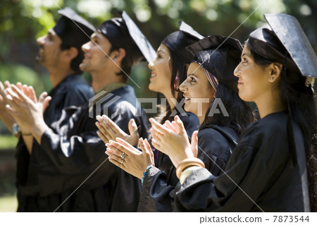 College students at graduation ceremony  7873544