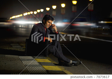 Businessman talking on the phone  7873617