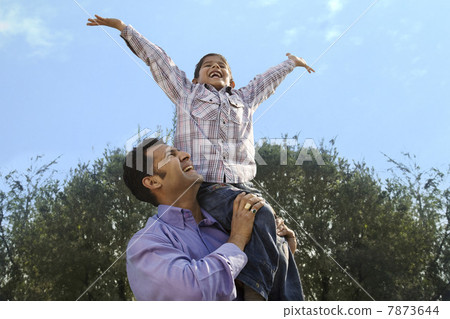 Father and son having fun  7873644