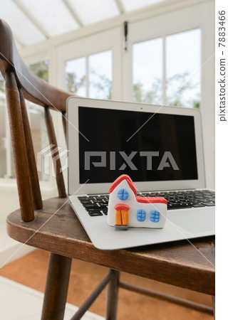 Laptop and home 7883466