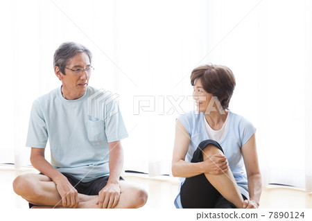 Middle couple stretching Middle couple stretching 7890124