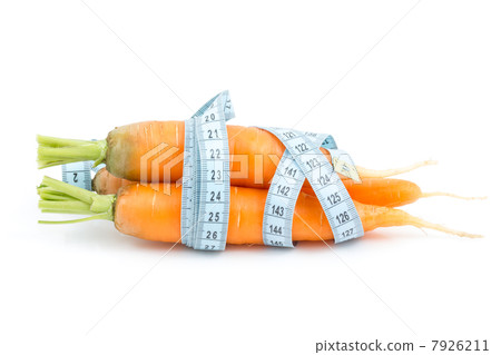 Healthy carrot with measure tape 7926211