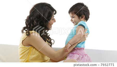 Mother holding her child 7932771