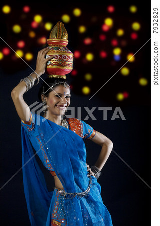 Gujarati woman holding a kalash Gujarati woman holding a kalash 7932829