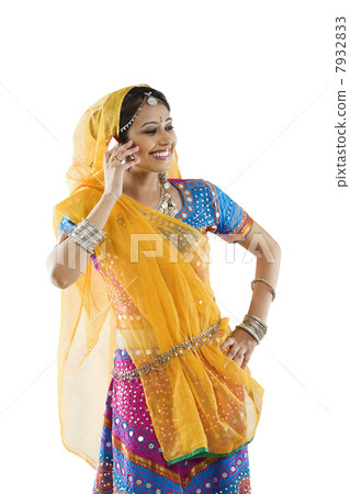 Gujarati woman talking on a mobile phone 7932833