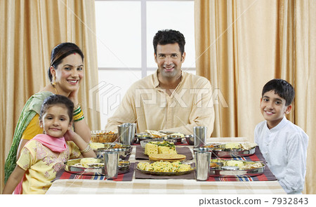 Gujarati family having lunch Gujarati family having lunch 7932843