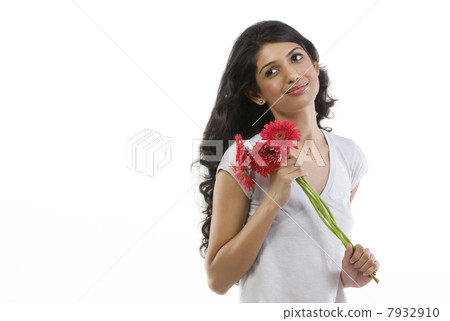 Portrait of a girl with flowers 7932910
