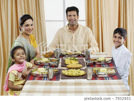 Gujarati family having lunch Gujarati family having lunch 7932931