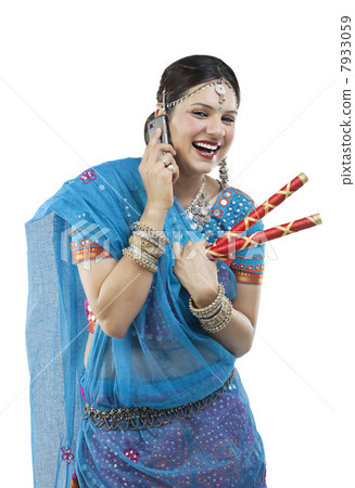 Gujarati woman talking on a mobile phone 7933059