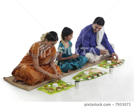 South Indian family having lunch South Indian family having lunch 7933071