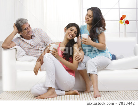 Portrait of a girl with her parents Portrait of a girl with her parents 7933442