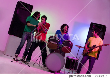 Boys of a rock band enjoying themselves 7933913