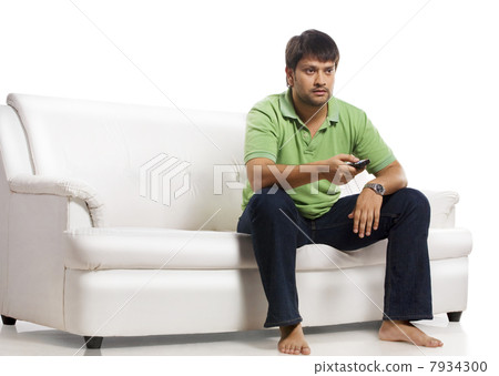 Man watching television Man watching television 7934300