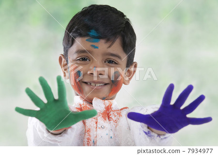 Boy with coloured palms Boy with coloured palms 7934977