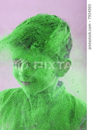 Boy covered with holi colour 7934993
