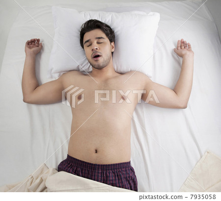 Man sleeping with his mouth open Man sleeping with his mouth open 7935058