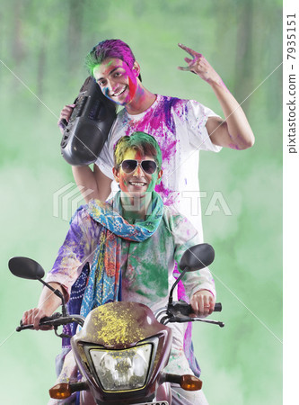 Men enjoying themselves on holi 7935151