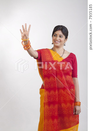A Rajasthani woman waving 7935185