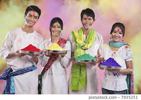 Friends holding trays with colours 7935251