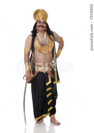 Portrait of a man dressed as Raavan with a sword 7939809