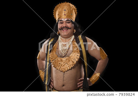 Portrait of a man dressed as Raavan smiling Portrait of a man dressed as Raavan smiling 7939824