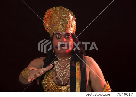 Portrait of a man dressed as Raavan gesturing Portrait of a man dressed as Raavan gesturing 7940017