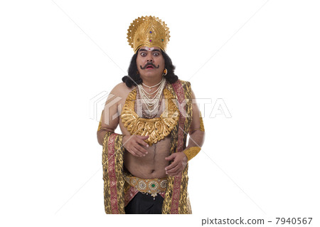Man dressed as Raavan looking surprised Man dressed as Raavan looking surprised 7940567