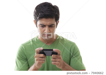 Close-up of smart guy reading text message over white background Close-up of smart guy reading text message over white background 7940662