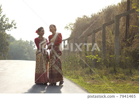 Bihu dancers sharing a laugh 7941465