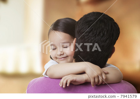 Cute little girl hugging her father 7941579