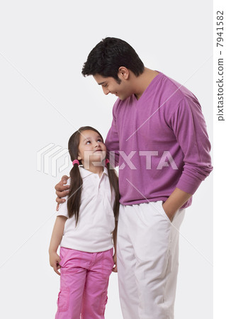 Father and daughter looking at each other 7941582