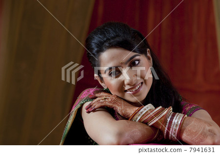 Close-up of happy beautiful young Indian bride 7941631