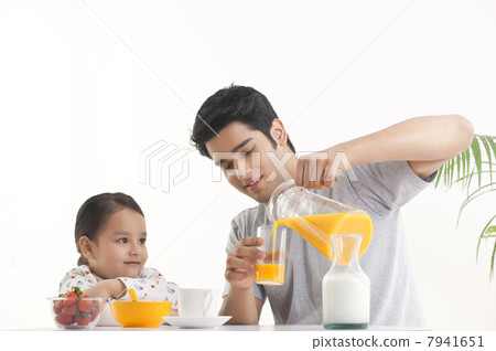 Father serving breakfast Father serving breakfast 7941651