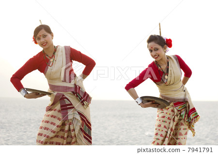 Portrait of Bihu women dancing with brass plates Portrait of Bihu women dancing with brass plates 7941791