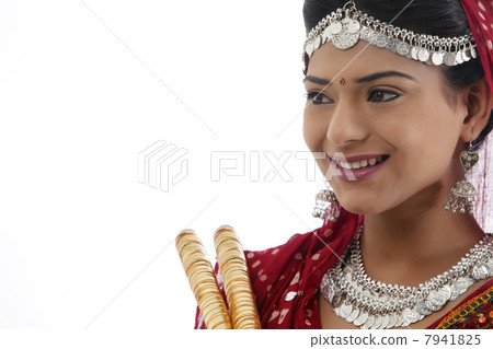 Female dandiya dancer with sticks Female dandiya dancer with sticks 7941825