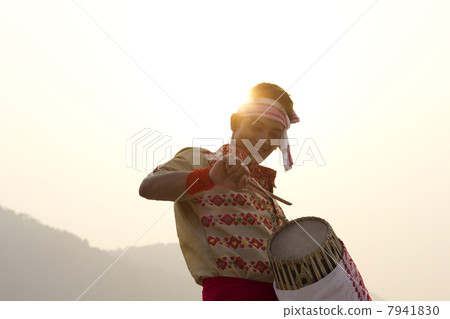 Bihu man playing on a dhol Bihu man playing on a dhol 7941830