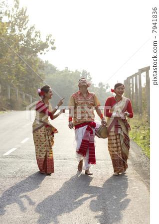 Bihu dancers sharing a laugh 7941836