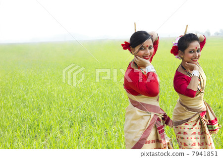 Portrait of women doing Bihu dance 7941851